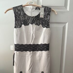 Bebe never worn black and white dress size M